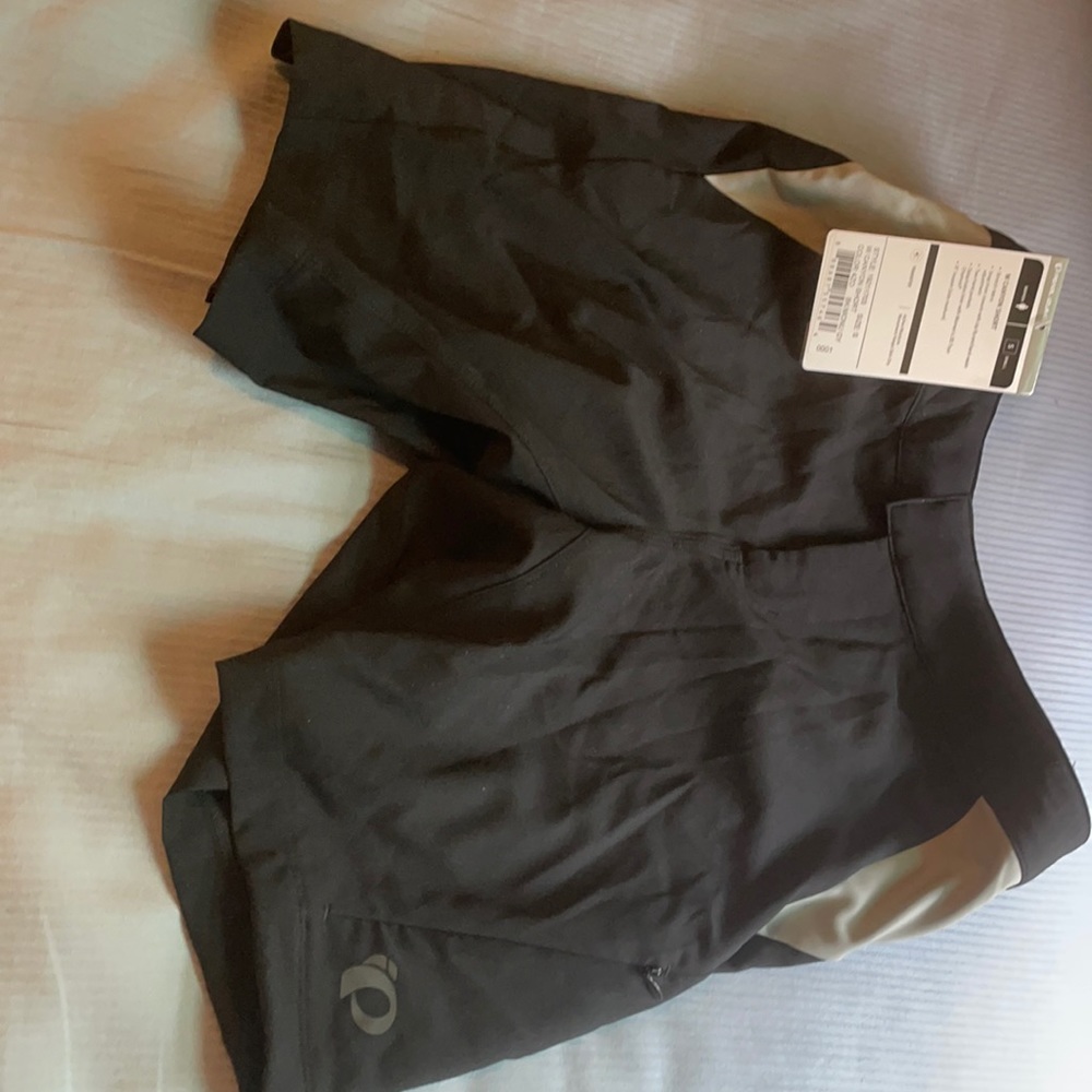 Brand new.  Tags. Padded bicycle Pearl Izumi short
